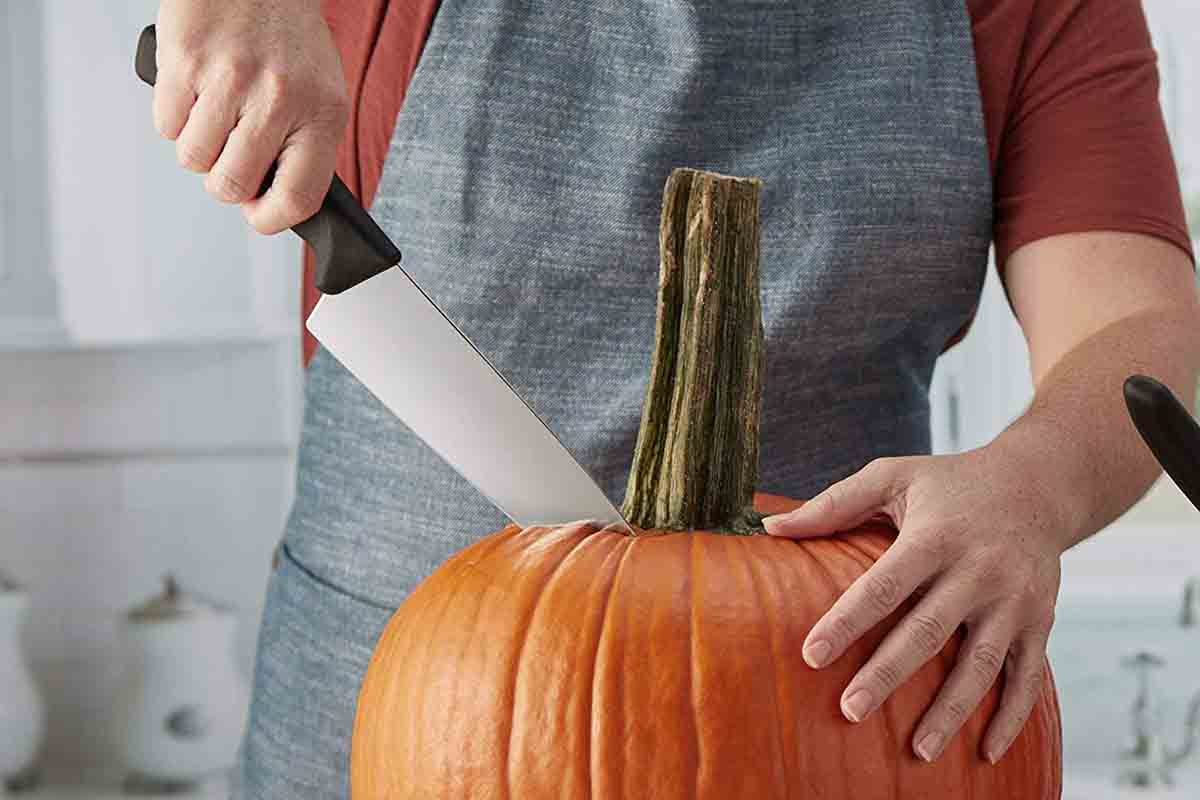 Victorinox 8-inch chef's knife cutting a pumpkin