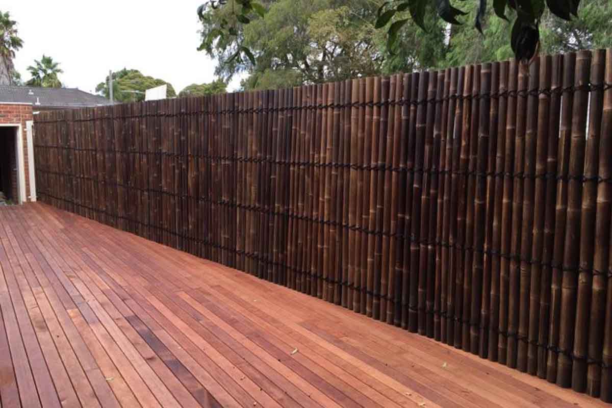 Reed Screens cover Chain Link Fence