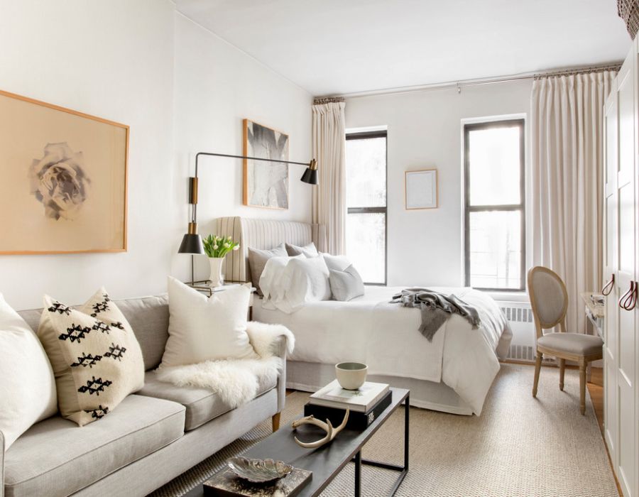 couch in the bedroom of an NYC apartment