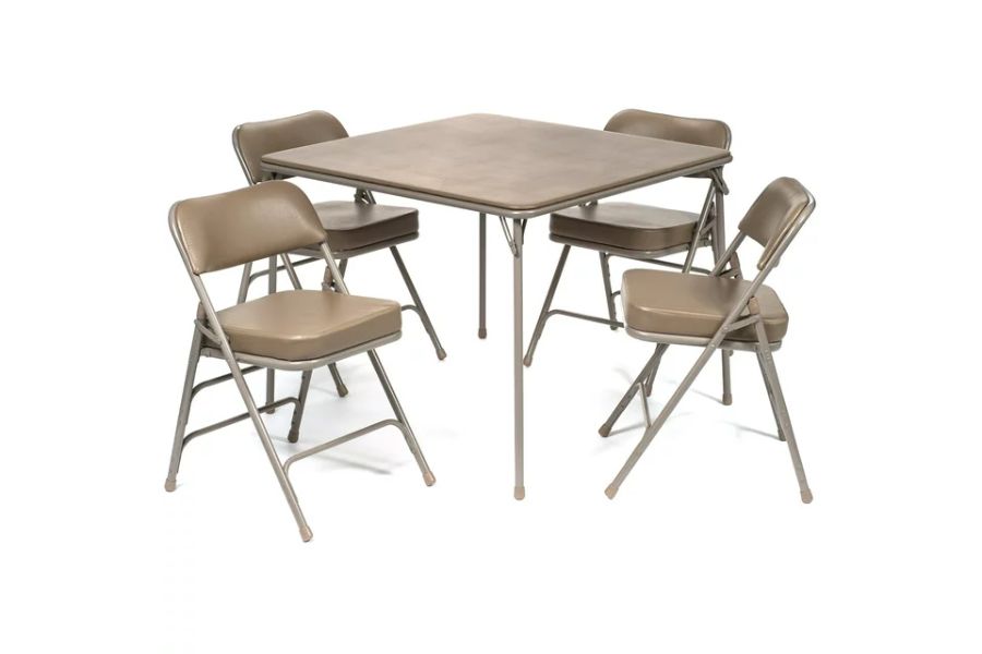 beige folding card table complete with chairs